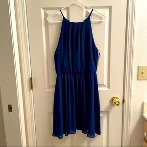 Blue high-neck party dress.